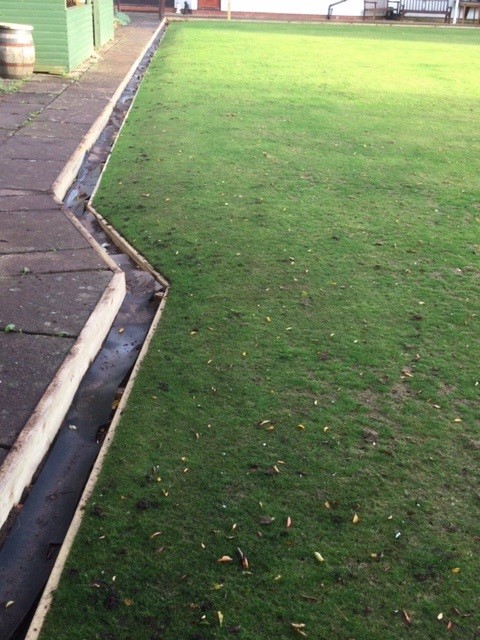 The gutter with new wooden sides. Taken from the back of the green looking towards the Clubhouse.