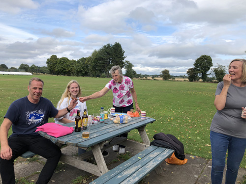 Chris & Family at a picnic table