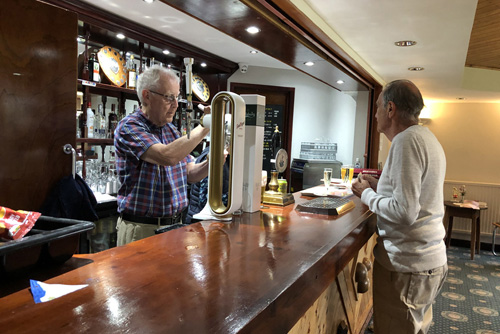 David serving Rod at the bar