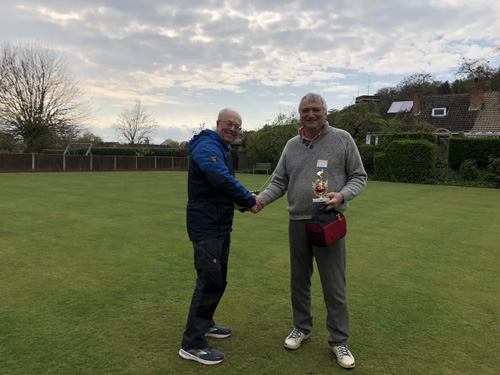 Martin accepts the trophy from Geoff on behalf of himself and Mike.