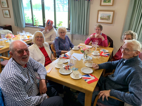 Sitting with food and drink. Ken, Margie, Dot, Norma, Mary & Angus