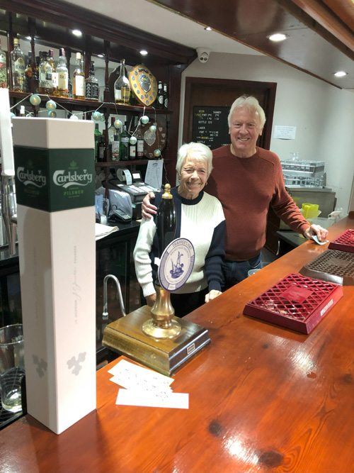 Sandra and Brian behind the bar