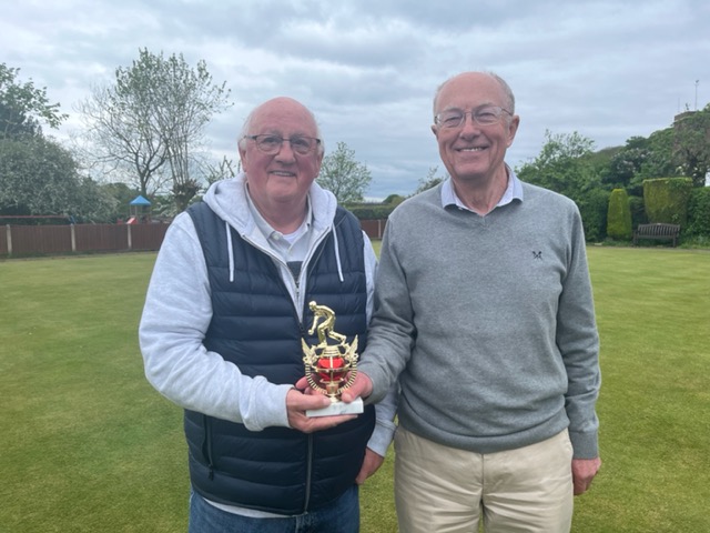 Winners - Howard and Geoff - holding the trophy