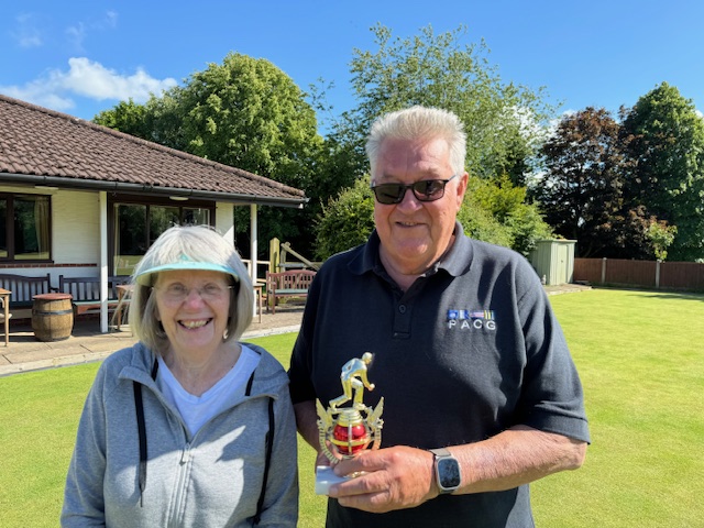 Kath and Dave pose with the trophy.