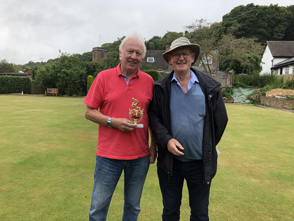 Brian (holding the trophy) posed with Len on the green.