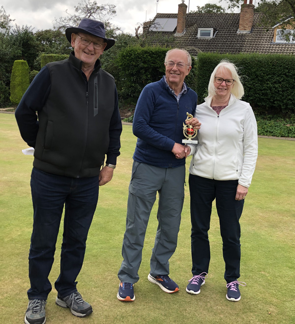 Geoff & Karen pose with the trophy. Len stands to one side.