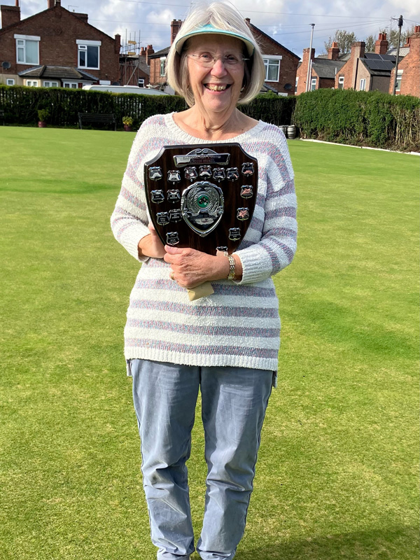 Kath poses with the Millennium Shield