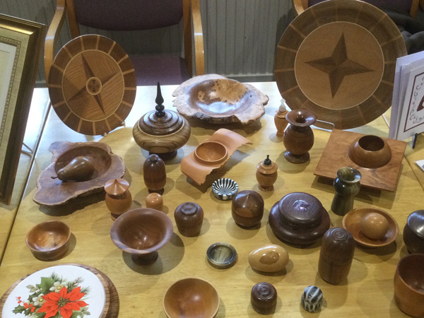 A table displaying wood turning by Kevin.